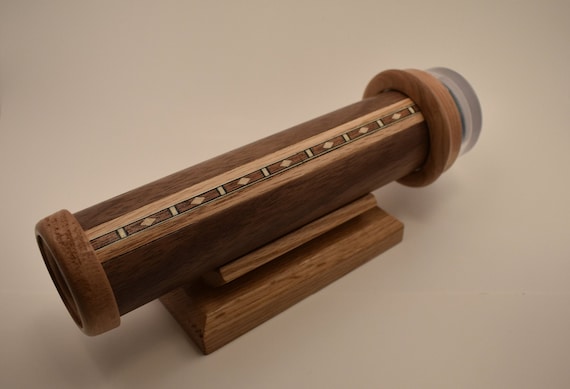 Handcrafted interactive kaleidoscope, it's like getting two kaleidoscopes In one package, our favorite.