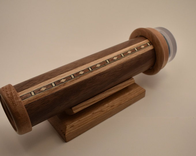 Handcrafted interactive kaleidoscope, it's like getting two kaleidoscopes In one package, our favorite.