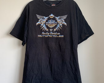 Distressed by hand done process to upcycle this one of a kind original. Womens size 1X Harley Davidson shirt