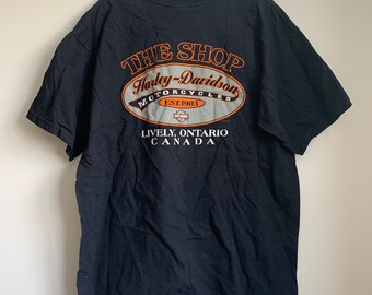 Distressed by hand done process to upcycle this one of a kind original. Womens size 1X Harley Davidson shirt