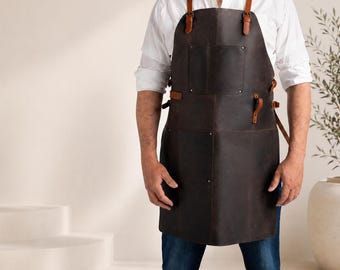 Braune Lederschürze -verstellbare Riemen, 2 große Taschen, brauner Zweifarbenton. Verwenden Sie als Grillen oder Holzarbeiten Schürze