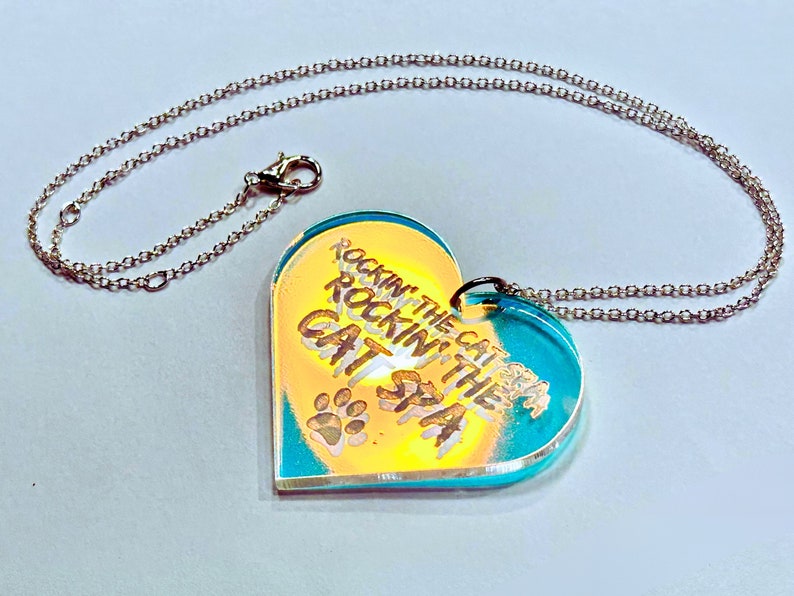 Misheard Lyrics Pendant Rockin' the Cat Spa Funny Music Novelty