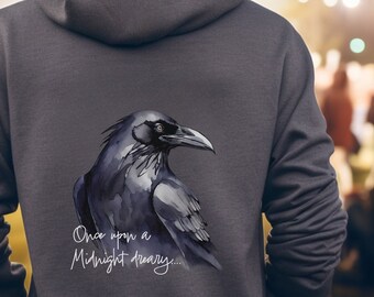 May include: A dark gray hoodie with a black raven illustration and the text "Once upon a midnight dreary..." printed on the back.