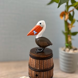 Bonita figura de pelícano, modelo de pelícano, miniatura de ave marina, figura de regalo, figura de animal, decoración de playa