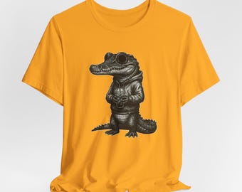 陰鬱なワニのシャツ、ワニのイラストが描かれたシャツ、ワニのグラフィックTシャツ、皮肉な爬虫類のシャツ、陰鬱な動物のアート、ユニークなTシャツギフト