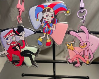 The Amazing Digital Circus charms, pillows, and stickers- Pomni, Jax, caine
