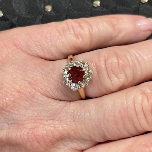 Vintage Garnet and Diamond Halo Ring in 14k Yellow Gold
