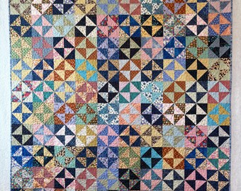 Trapunta con clessidre e girandole