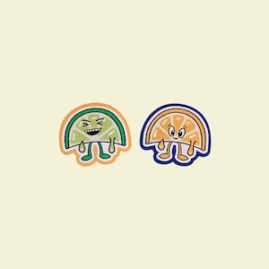 May include: A white ceramic mug with a black handle and the text "But First, Coffee" in a bold, black font. The mug is set against a blurred background, suggesting a cosy setting.