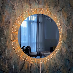 Illuminated mirror by Hillebrand