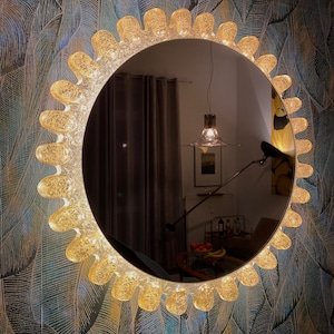 Illuminated mirror by Hillebrand
