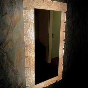 Illuminated mirror by Hillebrand