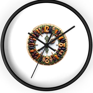 May include: A round white clock with black hands and a unique design. The clock face is made of dried fruits and nuts arranged in a circle, with the numbers 1 through 12 displayed around the edge.