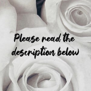 May include: Close-up of white roses with the text "Please read the description below" in black.