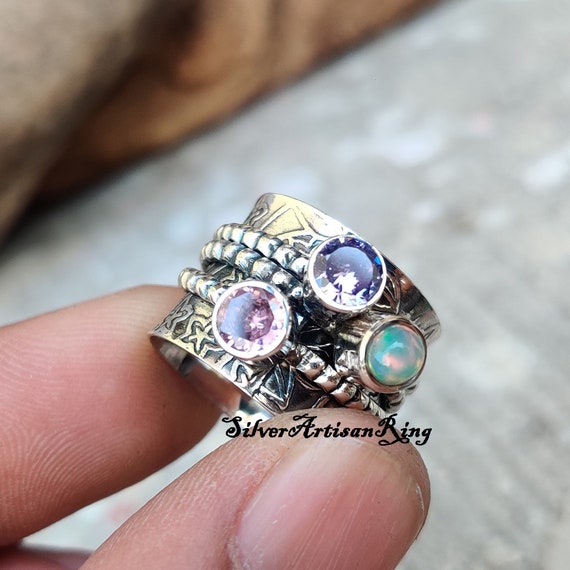 Sterling Silver Amethyst, Blue Topaz, Opal & Peridot Textured 4 Band Ring Set Sterling Silver Amethyst, Blue Topaz, Opal & Peridot Textured 4 Band Ring Set