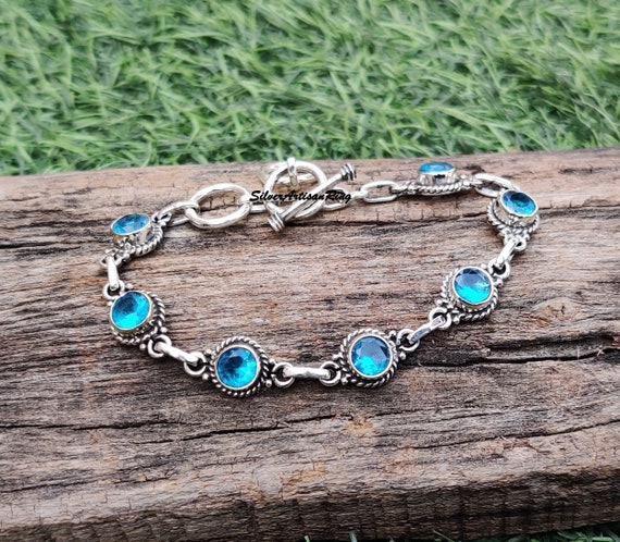 Blue topaz silver bracelet discount