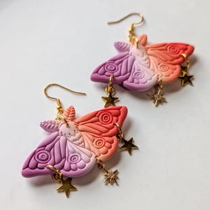 Lesbian pride moth earrings cryptid dangles kitschy hook earrings gold pride month earring cute queer whimsical lgbtq