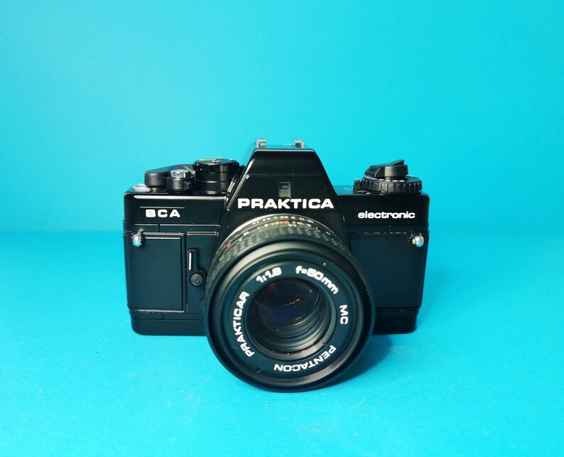 1986 Praktica BCA Electronic SLR 35mm Film Camera wPraktica 50mm f1.8 lens /& cap