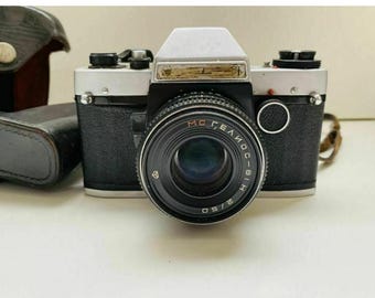 Couvercle d'objectif de couleur noire rare pour appareil photo vintage, fabriqué par Russin