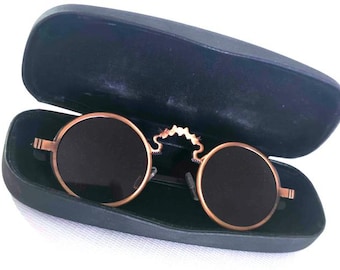 Gafas de sol redondas de diseño vintage en color bronce. Regalo unisex único y muy especial. Cosas antiguas.