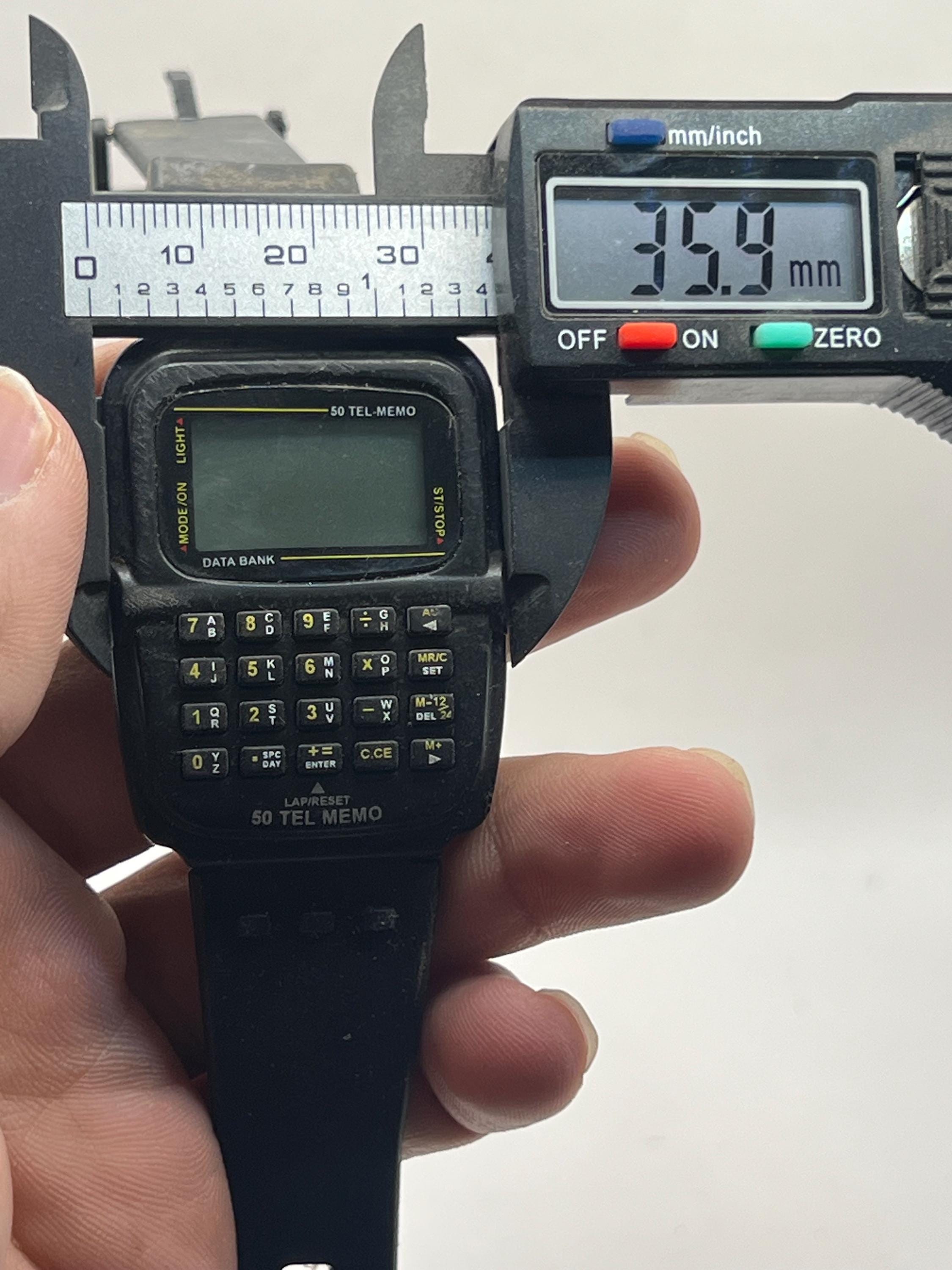 50 memory data bank calculator watch 50 TEL MEMO digital wrist watch not working for parts digital