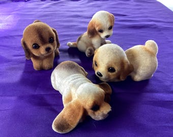 4 Small Flocked Puppies - 2 plastic Hong Kong & 2 bisque  -  1960's -70's (798A)