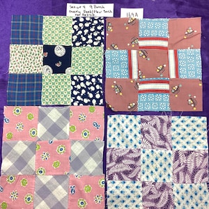 May include: Four sets of nine-patch fabric squares, each with a unique patchwork design. The fabrics feature floral, plaid, and patterned prints in shades of blue, pink, and purple. The text in the image reads "Set of 4 9 Patch mostly Feed/Flour Sack not Reprod."