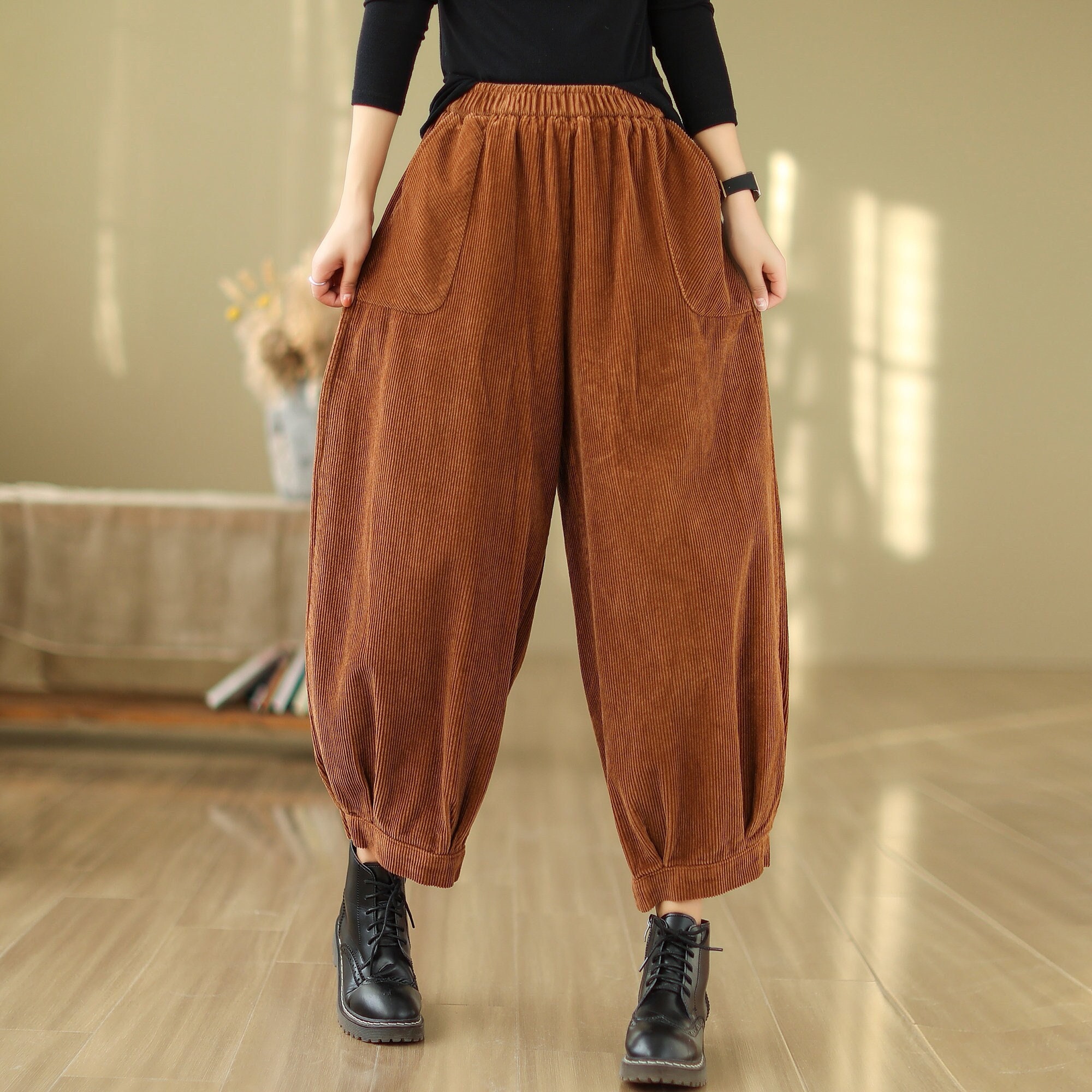 1960s authentic vintage orange rust corduroy. flare pants women's. size  small. Xs