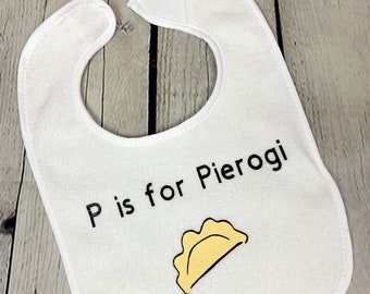 P es para babero polaco Pierogi