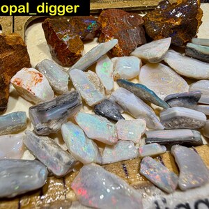 AUSTRALIAN OPAL mixed fields rough and rubs Black Crystal Boulder all with Top color 267 cts 53.4 grams We pay USA Tariffs an free postage