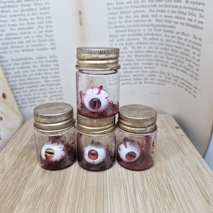 Screw-top jar with red Fimo eyes - LARP / Curiosity / Horror / Halloween