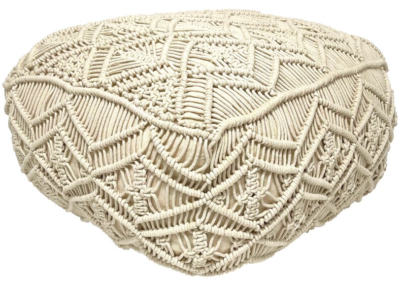 May include: A cream-colored, round, macrame pouf with a geometric pattern. The pouf is made of thick, knotted rope.