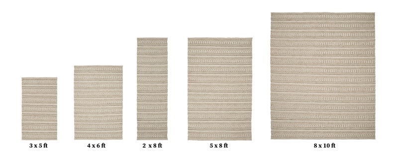 May include: A set of five beige woven rugs in various sizes, ranging from 3x5 feet to 8x10 feet. The rugs have a subtle striped pattern.