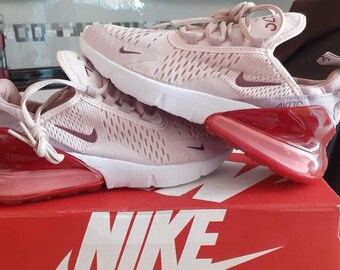 all pink nike shoes