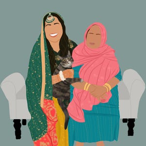 May include: Two women in traditional clothing are sitting on a white couch with a cat. The woman on the left is wearing a green and gold patterned dress with a pink scarf. The woman on the right is wearing a pink scarf and a blue and white patterned dress. The cat is gray and white and is sitting on the woman's lap. The text "Forever in my heart" is written at the top of the image.