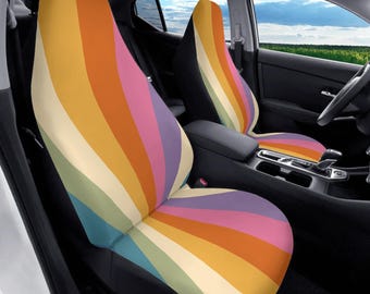 Funda de asiento de coche con diseño retro de rayos de sol y arcoíris, colorida.