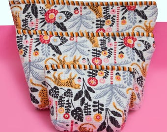 Handmade block printed cotton quilted pouch set.