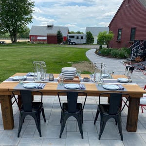 Delightful Outdoor Handmade Farmhouse Dining Table Made from Reclaimed Local Barn Wood