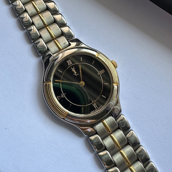 Vintage Ladies’ Two Tone Y.  S.  L with silver stainless strap