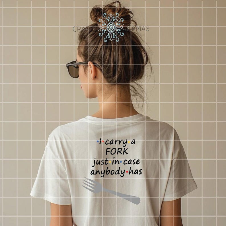 May include: White t-shirt with the text "I carry a FORK just in case anybody has" and a fork graphic. The shirt is worn by a person with sunglasses and a bun hairstyle.