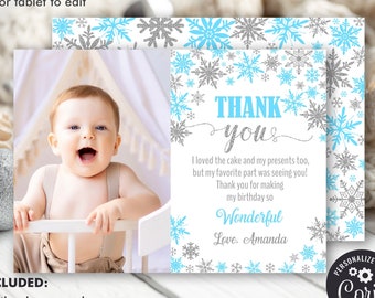 May include: A blue and silver snowflake thank you card with a photo of a baby boy. The card says "Thank you" and "I loved the cake and my presents too, but my favorite part was seeing you! Thank you for making my birthday so Wonderful. Love, Amanda."