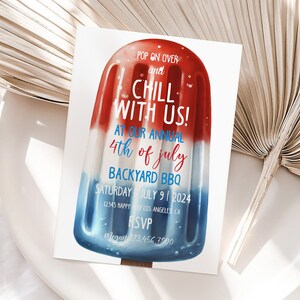 May include: Red, white, and blue popsicle graphic invitation for a 4th of July backyard BBQ. The invitation says "Pop on over and chill with us!" at our annual 4th of July backyard BBQ. Saturday, July 9, 2024. 12345 Happy Way, Los Angeles, CA. RSVP Megan 123.456.7990.