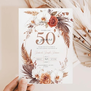 May include: An invitation card for a wedding anniversary, featuring a floral and botanical design. The card displays the text "Celebrating 50 years" and event details. The design incorporates white orchids, rust-coloured roses, and dried foliage, creating a warm aesthetic.