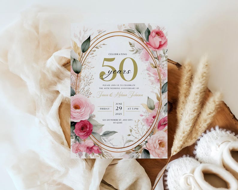 May include: A gold and white wedding anniversary invitation with pink and white floral illustrations. The invitation reads "Celebrating 50 years" and includes the date "June 29, 2025" and time "at 5 PM".