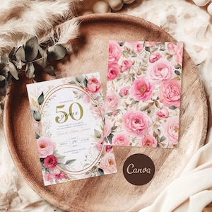 May include: A white invitation card with gold accents and a floral design. The card features the text "Celebrating 50 years" and a floral pattern with pink roses. The card is on a wooden surface with a white fabric background.