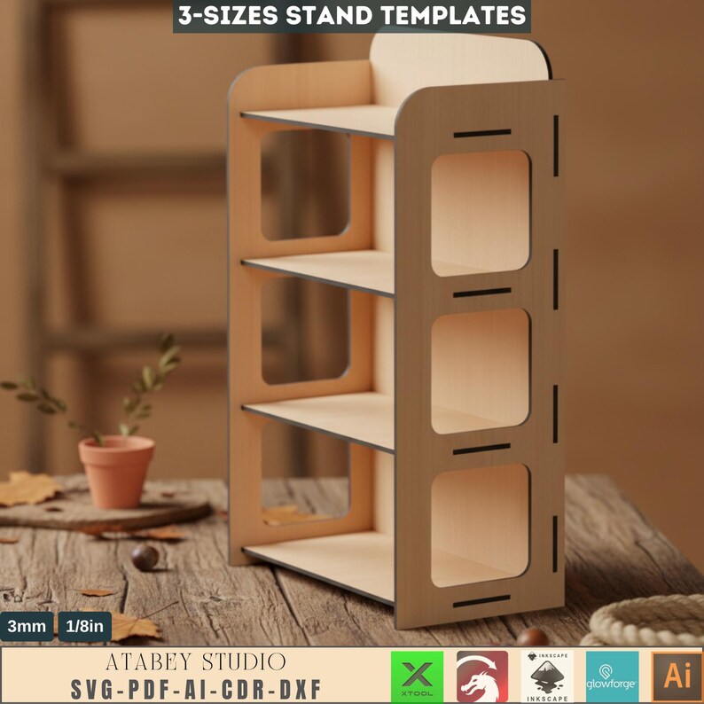 May include: A wooden, three-tiered stand with a light-colored finish. The stand has a rectangular shape with rounded edges and square cutouts on the side. The text "3-SIZES STAND TEMPLATES" is at the top. The stand is 1/8in thick.