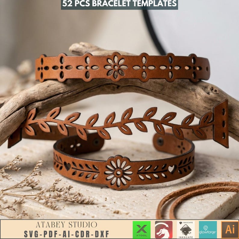 May include: Two brown leather bracelet templates with floral and leaf cut-out designs. The bracelets are displayed on a wooden branch. The text "52 PCS BRACELET TEMPLATES" is at the top. The bottom of the image has the text "ATABEY STUDIO SVG-PDF-AI-CDR-DXF".