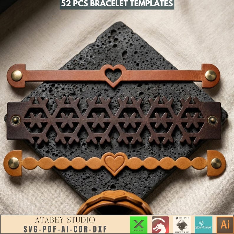 May include: Three leather bracelet templates in shades of brown, featuring heart and snowflake cutouts. The bracelets have brass-colored hardware and are displayed on a dark, textured surface. Text at the top reads "52 PCS BRACELET TEMPLATES".