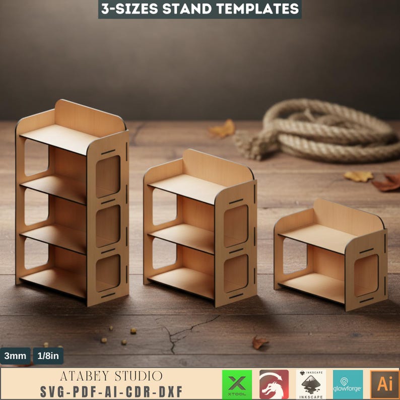 May include: Three wooden stand templates in varying sizes. Each stand has shelves and a rectangular frame with cut-out details. The text "3-SIZES STAND TEMPLATES" is at the top. The bottom of the image includes the text "ATABEY STUDIO SVG-PDF-AI-CDR-DXF".