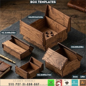 Könnte beinhalten: Verschiedene Holzbox-Vorlagen in verschiedenen Größen, mit Zoll-Maßen. Die Boxen sind aus dunklem Holz gefertigt, die Maserung ist sichtbar. Der Text "BOX TEMPLATES" und "ATABEY STUDIO" ist ebenfalls vorhanden.